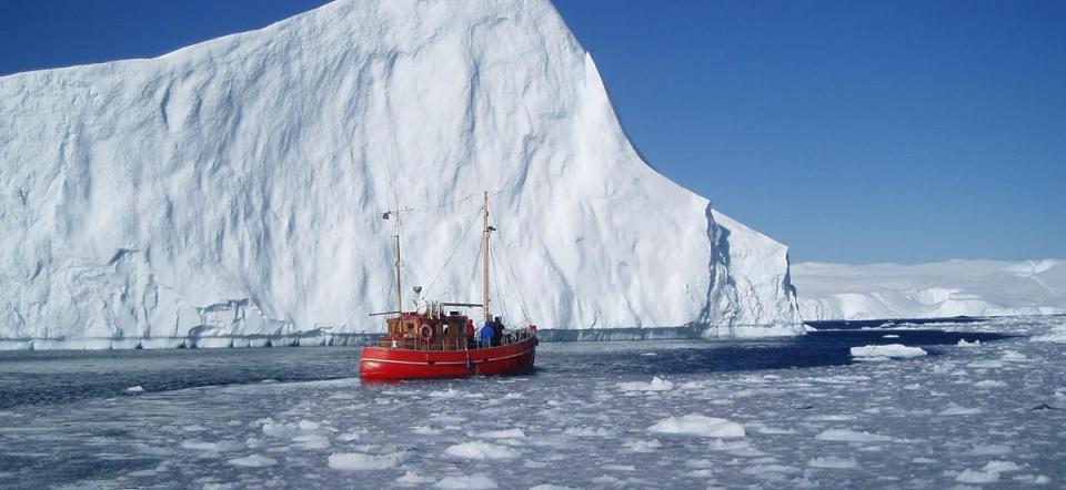 ice iceberg arctic boat winter 