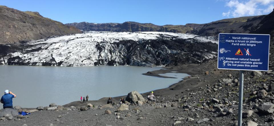 glacier in Iceland with a warning sign