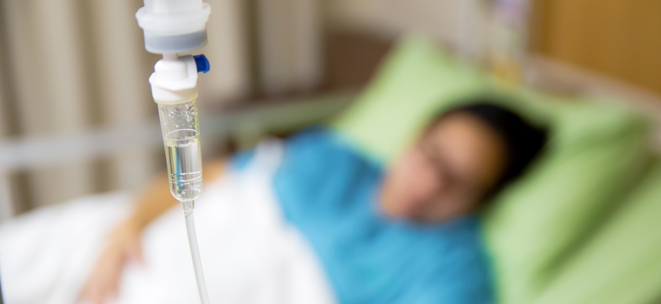 Photo: Adobe stock. Patient får medicin