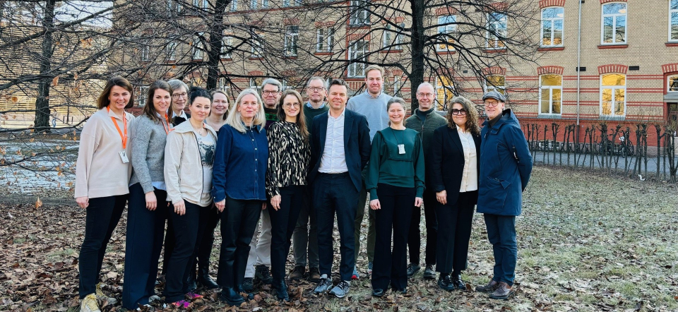 Group of people in front of old buuilding