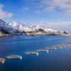aquaculture production in nothern Norway surrounded my snowy mountains 
