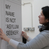 Nadia Mendez Guevara prepares the exhibition. Credit: IOE Communications